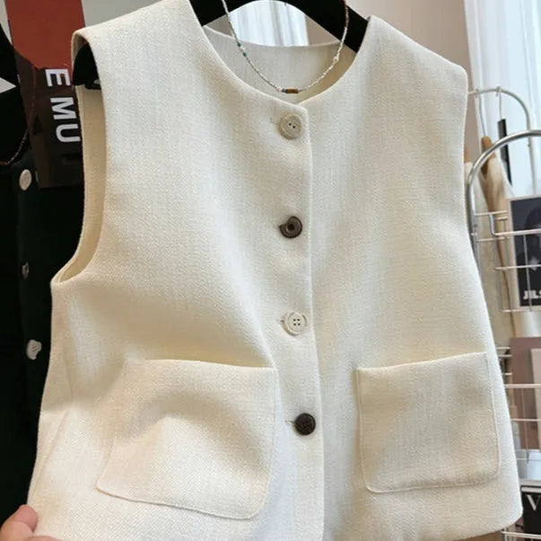 Women's French style bandage vest in milky white polyester with round neck and sleeveless design