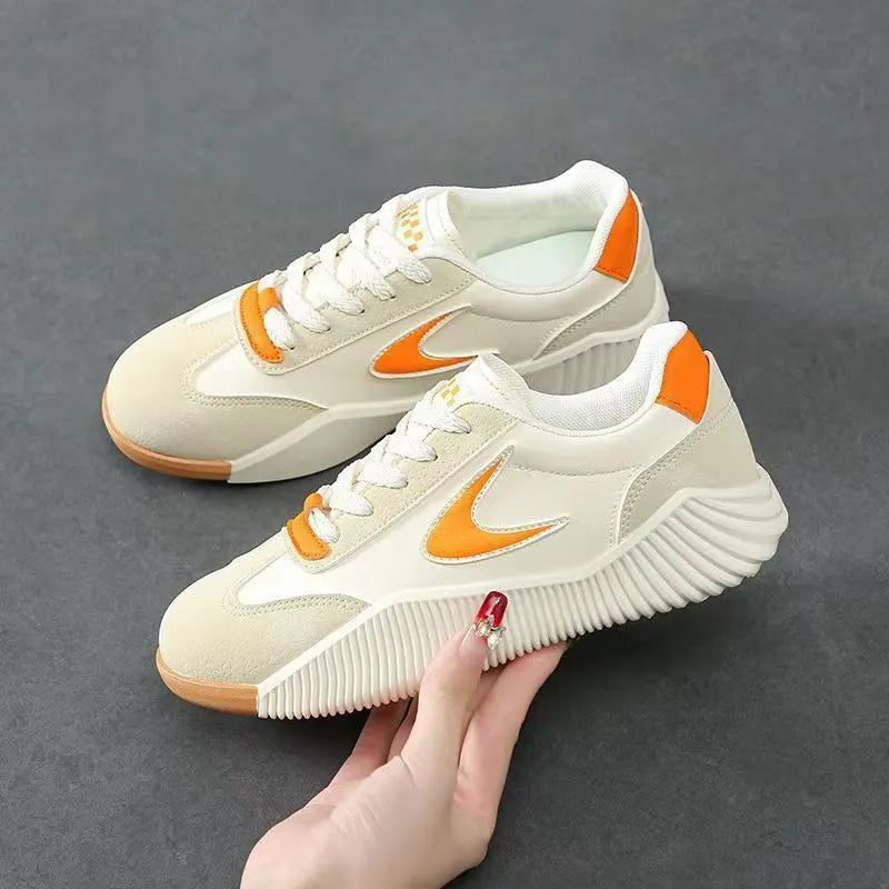 Soft leather casual sneaker in beige orange, low top flat heel round toe, with rubber sole