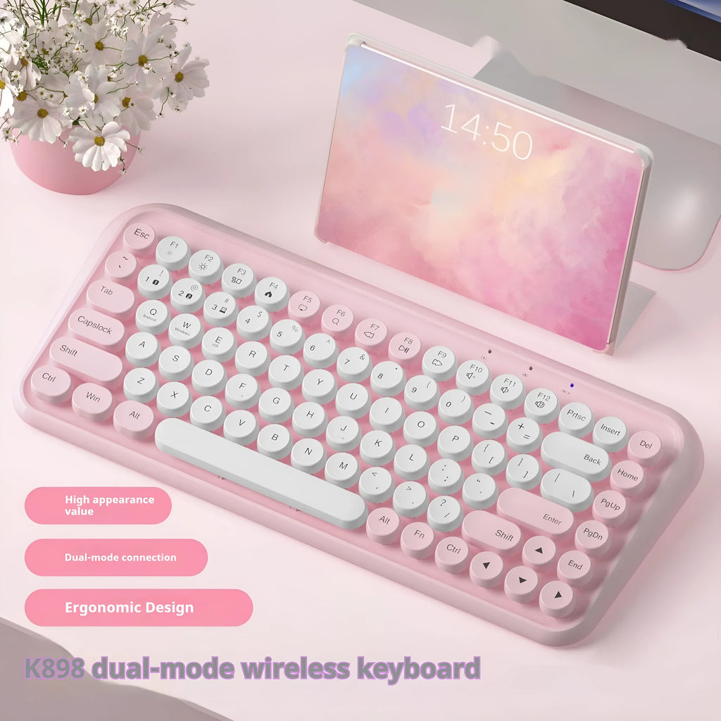 Pink wireless Bluetooth keyboard with 84 keys and compact portable design