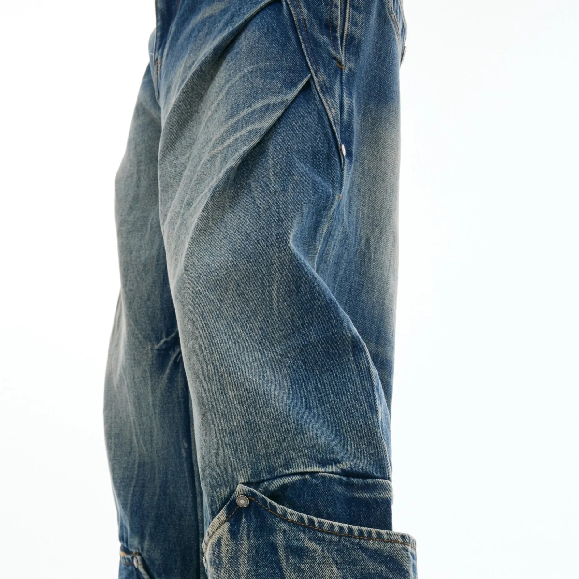 Men's verdant blue retro jeans with burst pattern and curved knife detailing