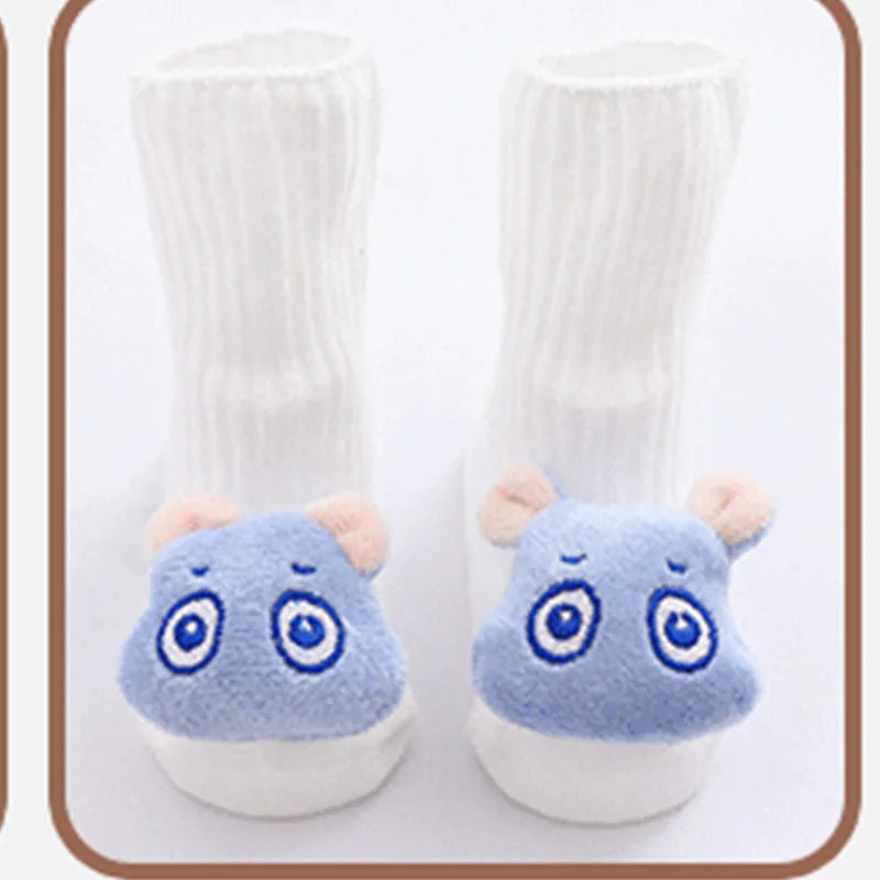 Cotton baby floor socks in various colours and patterns with size guide for ages 0-3 months
