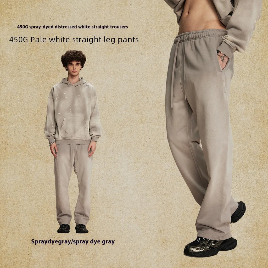 Men's loose cotton trousers in spray dyed colour, straight leg mid-rise cut for retro street style