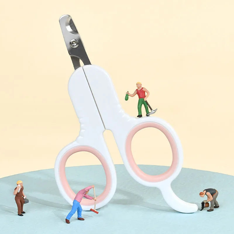 Professional grey pet nail clippers with curved tips and rubber-coated ergonomic handle.