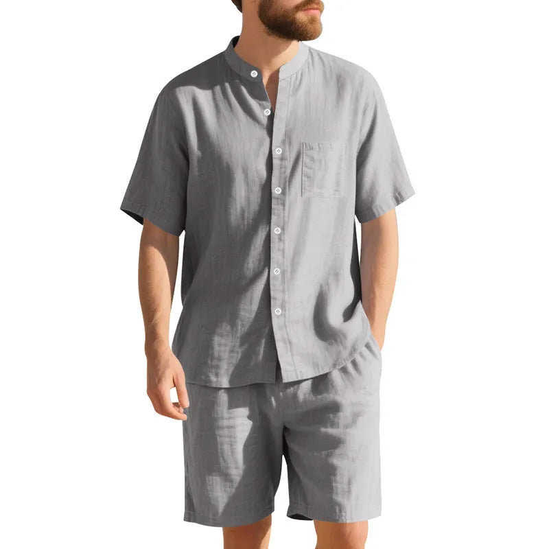 Men's light blue short sleeve linen shirt and shorts two-piece casual suit set on a hanger.