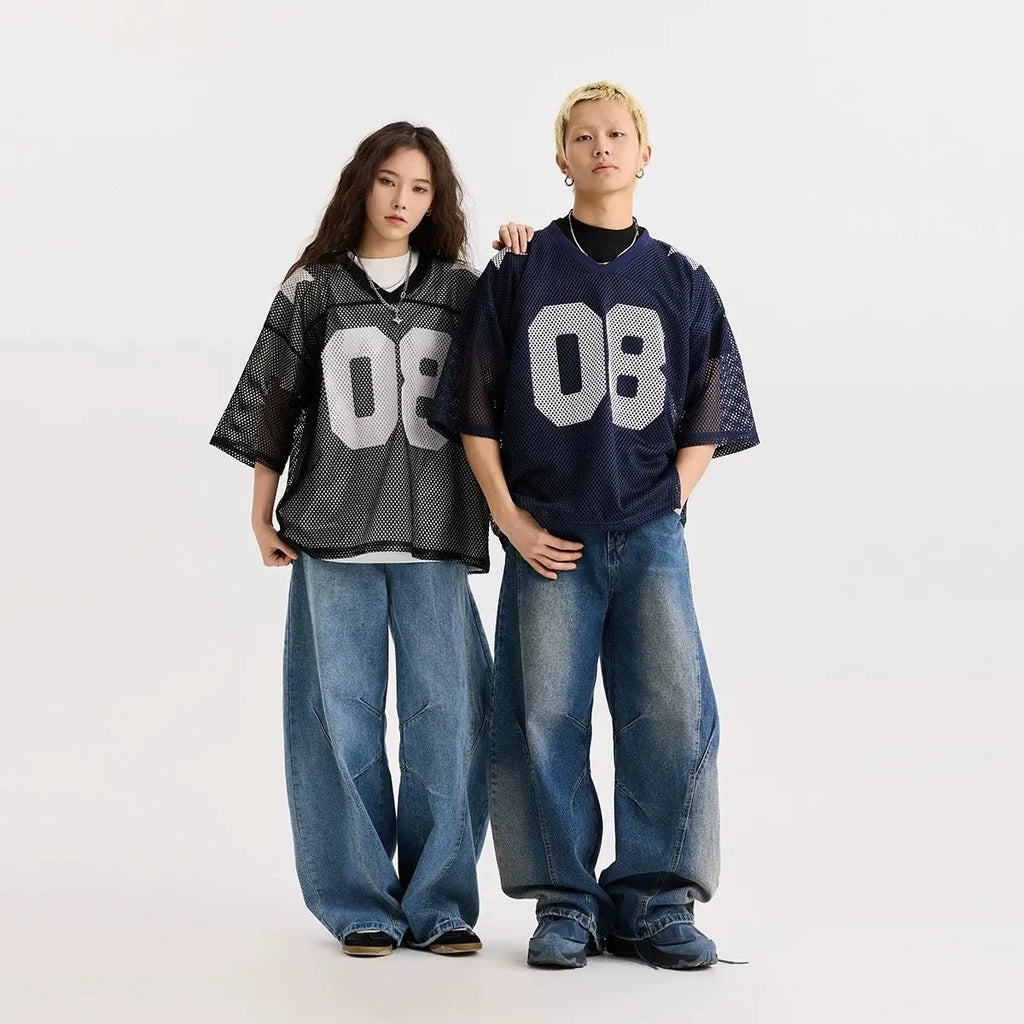 Letter pattern pullover shirt in loose fit with short sleeves available in black or navy blue