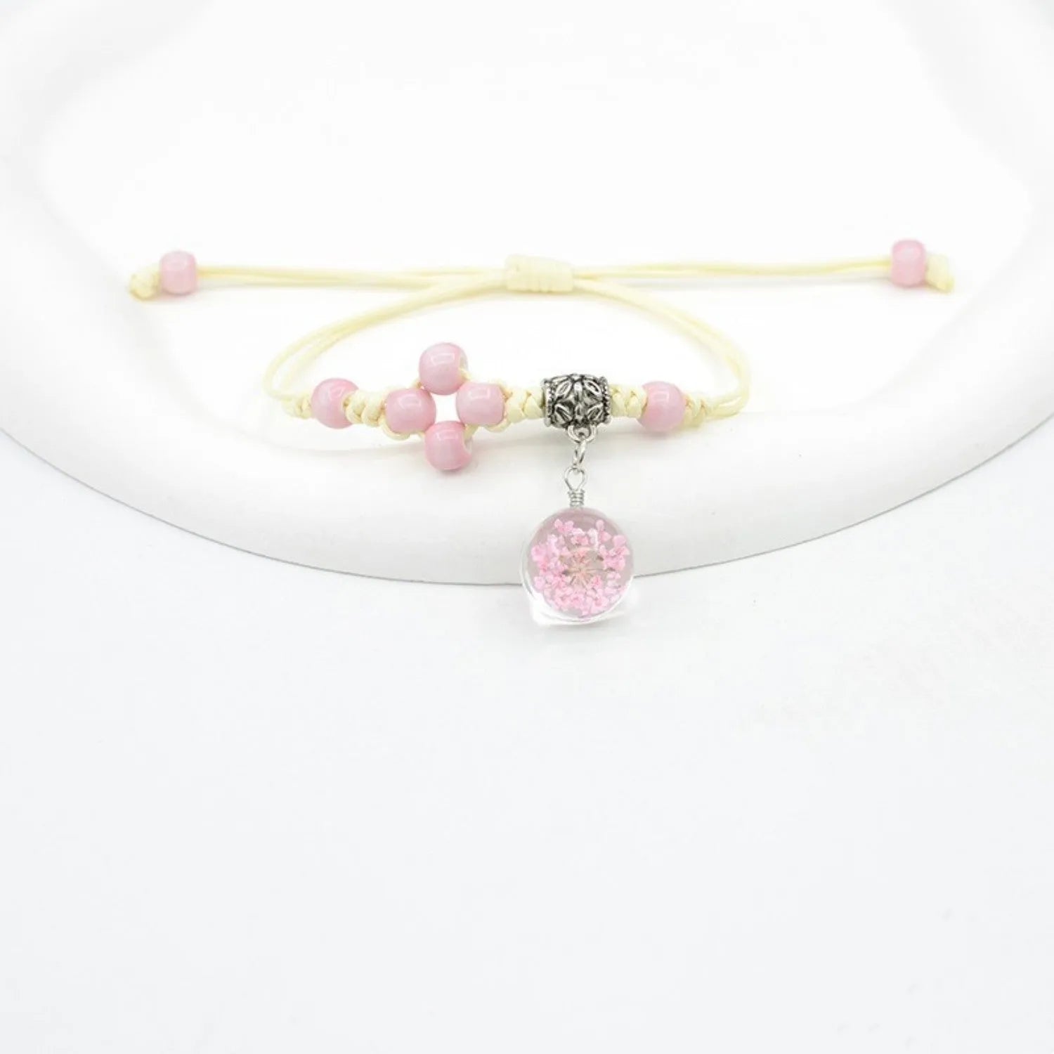 Women's hand-woven glass dried flower bracelet with large 1.4 cm beads in multiple colour options.