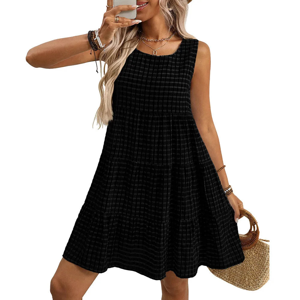 Women's light blue sleeveless plaid dress with oversized swing skirt on a hanger.