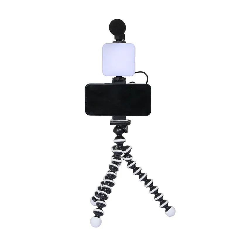 Universal LED mini square camera flash with rotatable head on a tripod stand.