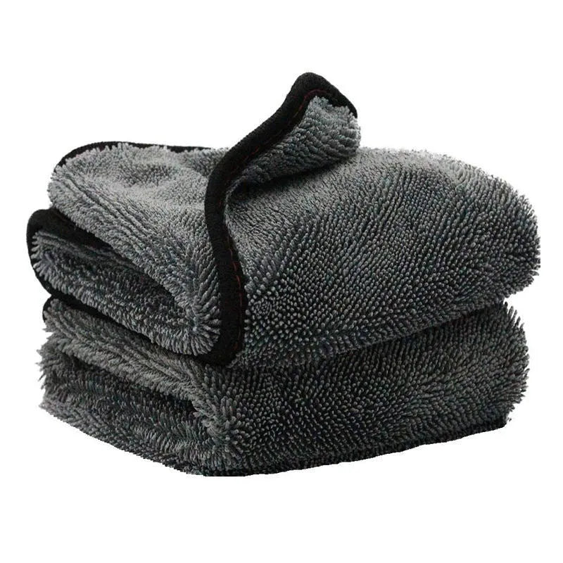 Grey square microfiber car wash towel for drying vehicles.