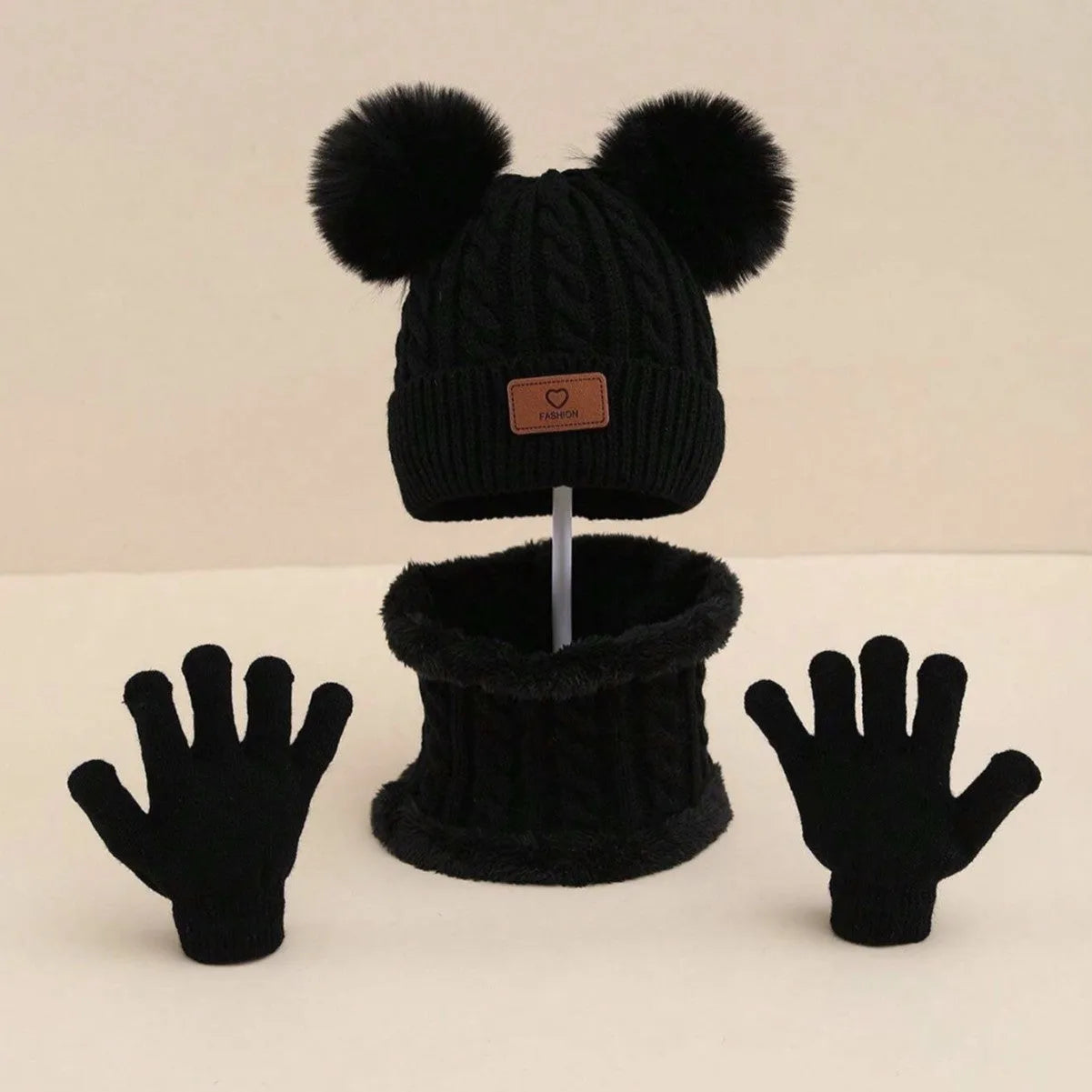Children's three-piece acrylic knit winter set with dome crown hat and matching scarf and gloves in pink