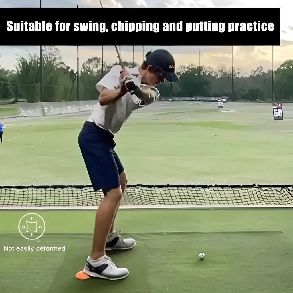 Orange natural rubber golf training mat with centre of gravity zone for swing practice