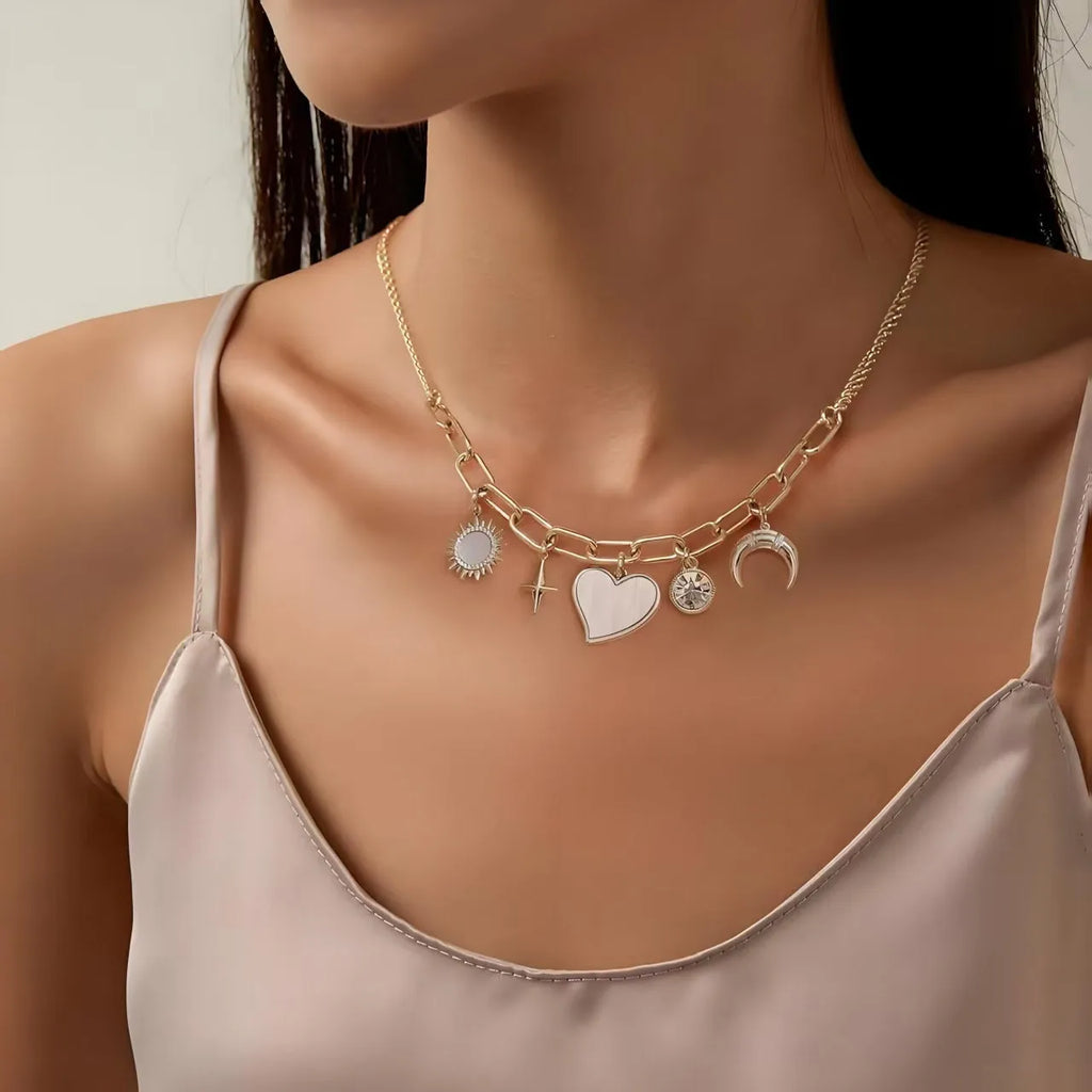 Gold alloy heart-shaped pendant necklace with inlaid zircon moon and star on bamboo chain