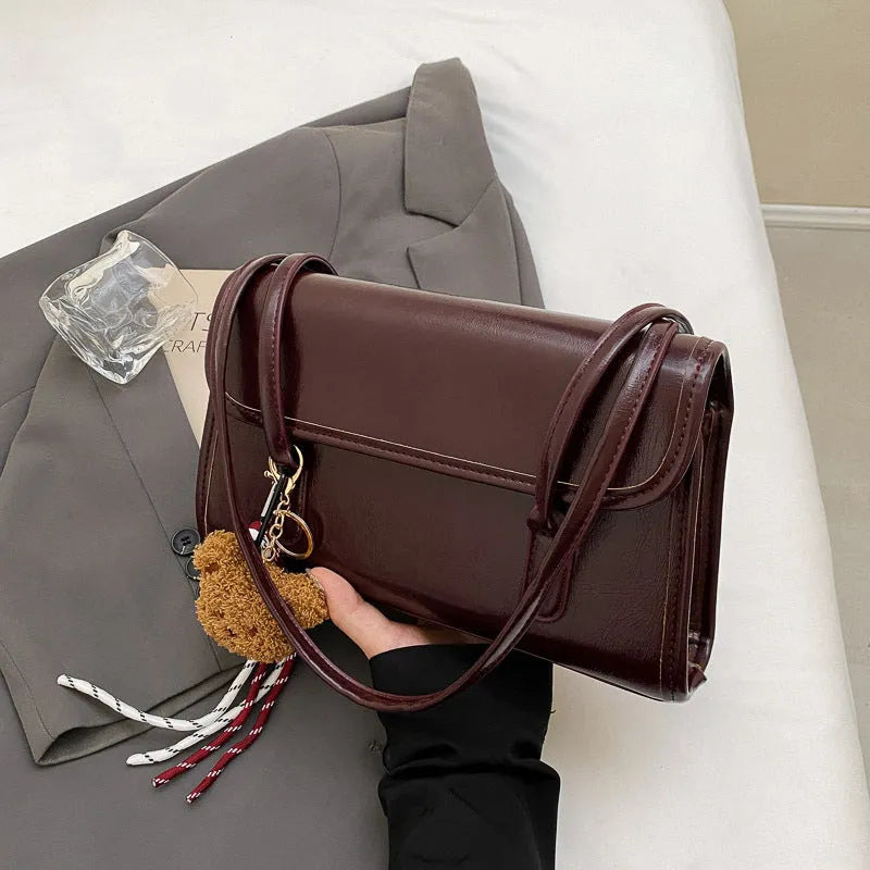 Women's brown Maillard PU leather shoulder bag with double straps and pendant attachment