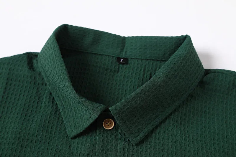 Retro waffle pattern dark green lapel Polo shirt with short sleeves and two metallic buttons