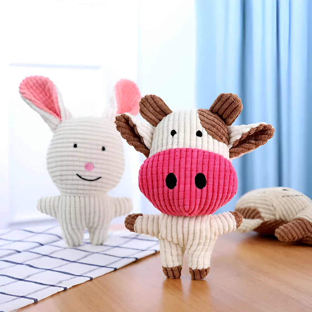 Animal shaped plush dog chew toy with squeaker in blue, brown, cow, grey, pink, white or yellow
