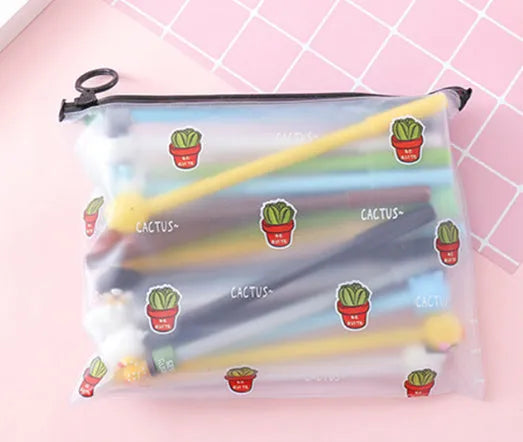 Set of 20 black 0.5mm ballpoint pens with cartoon cactus designs in plastic storage case measuring 21cm by 17cm