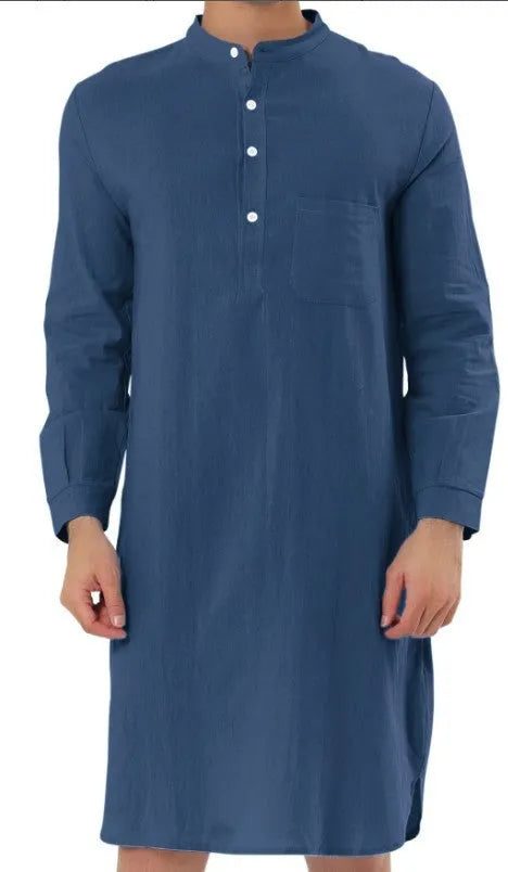 Man wearing a light blue cotton shirt-style robe with front pockets, showcasing casual loungewear.