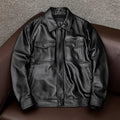 Men's black retro-style lapel short PU leather jacket with side pockets on a mannequin.