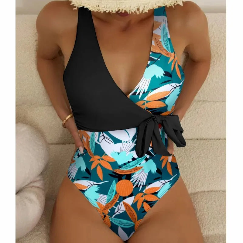 Women's high-waist one-piece swimsuit with an all-over printed pattern in a conservative style.