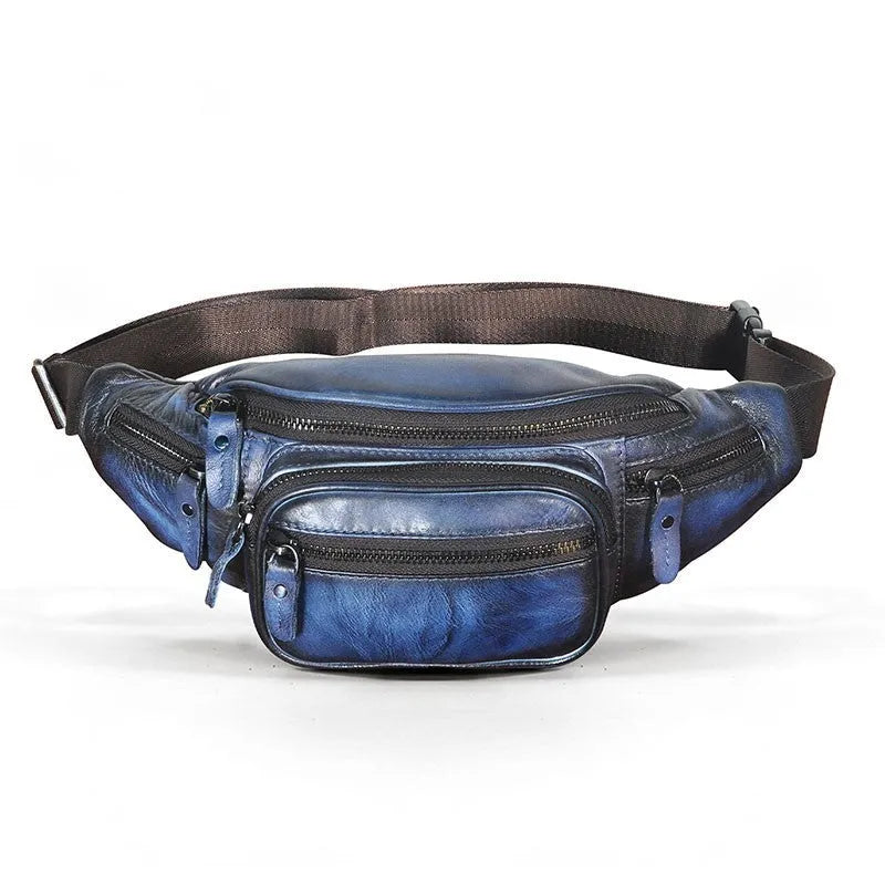 Brown leather shoulder messenger bag with a single strap and magnetic buckle closure.