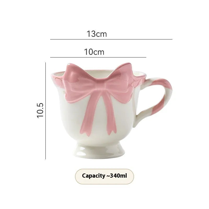 Ceramic mug with girl heart bow design in black pink colour