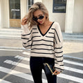 Loose fit striped polyester pullover top in apricot colour, street hipster style, front view