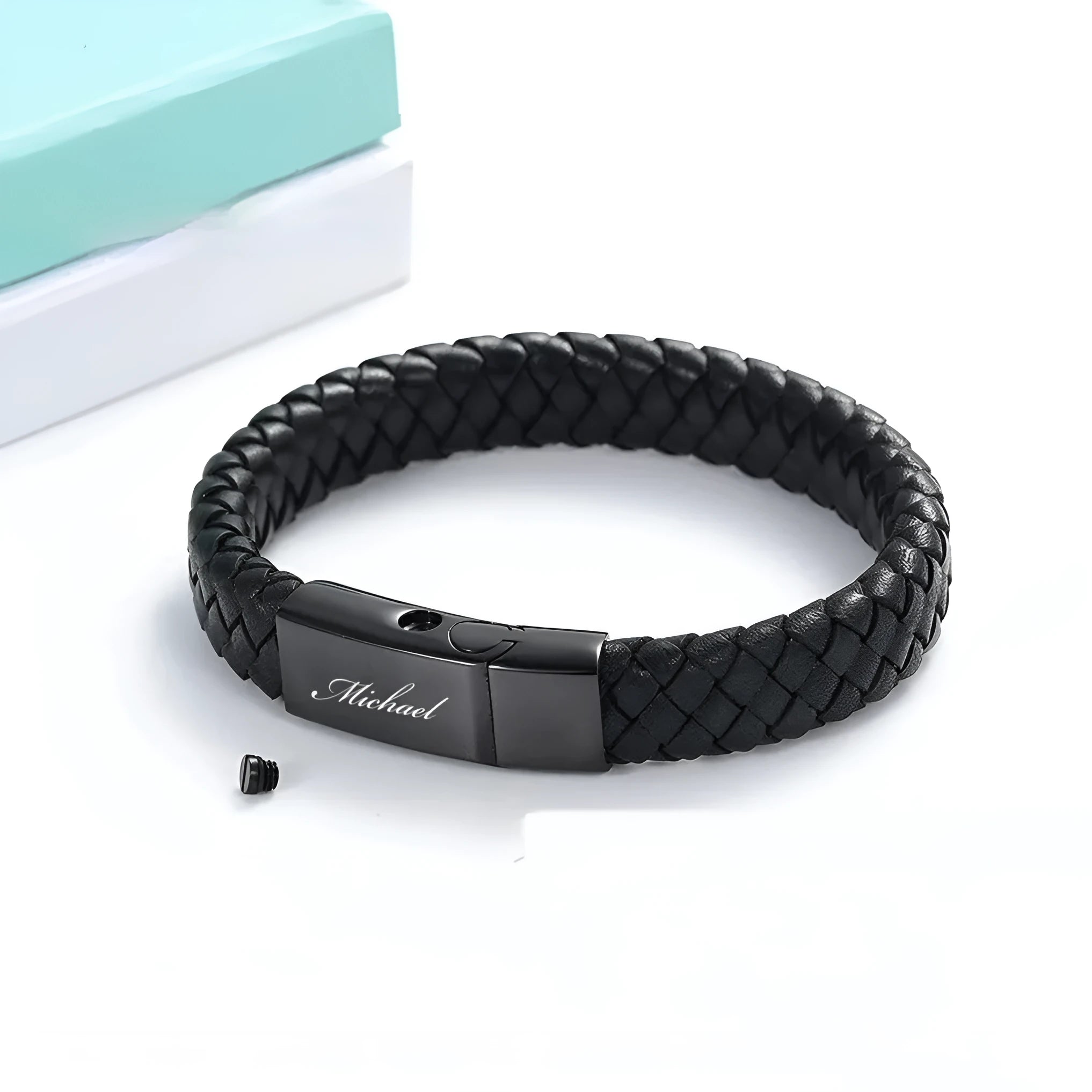 Black woven stainless steel cinerary bracelet with personalised text in gift box