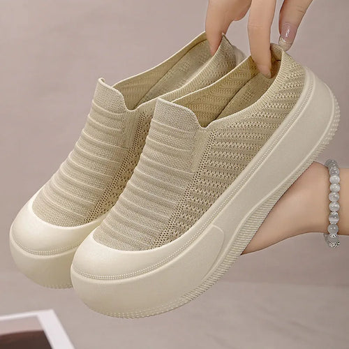 Women's closed-toe Flyknit slippers in beige, black, coffee, and yellow with low-cut profile and PVC sole.