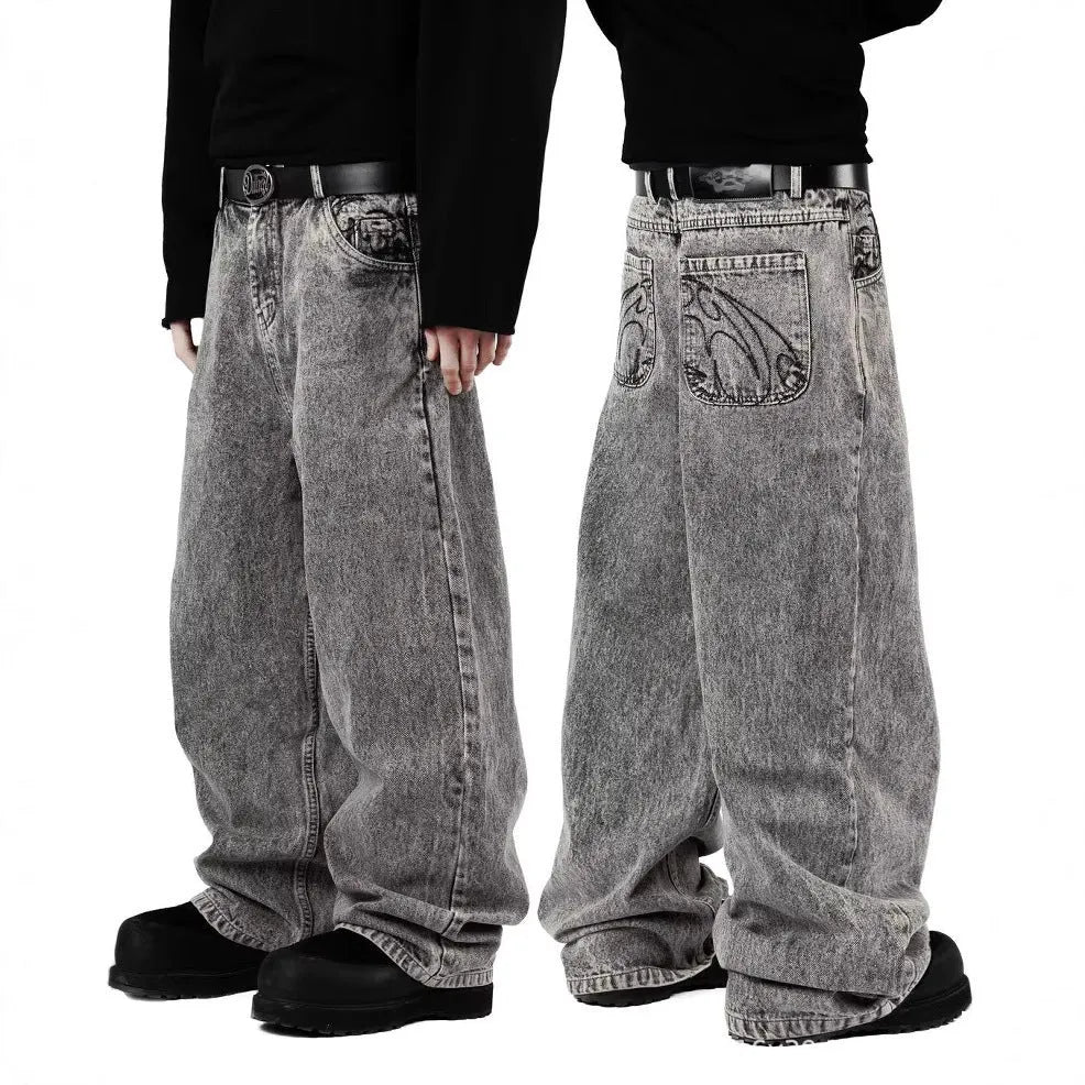 Grey loose fit straight-leg denim trousers for men on a white background