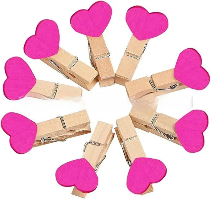 Five handmade solid wood heart-shaped hair clips in red, white, pink, yellow, and rose colours