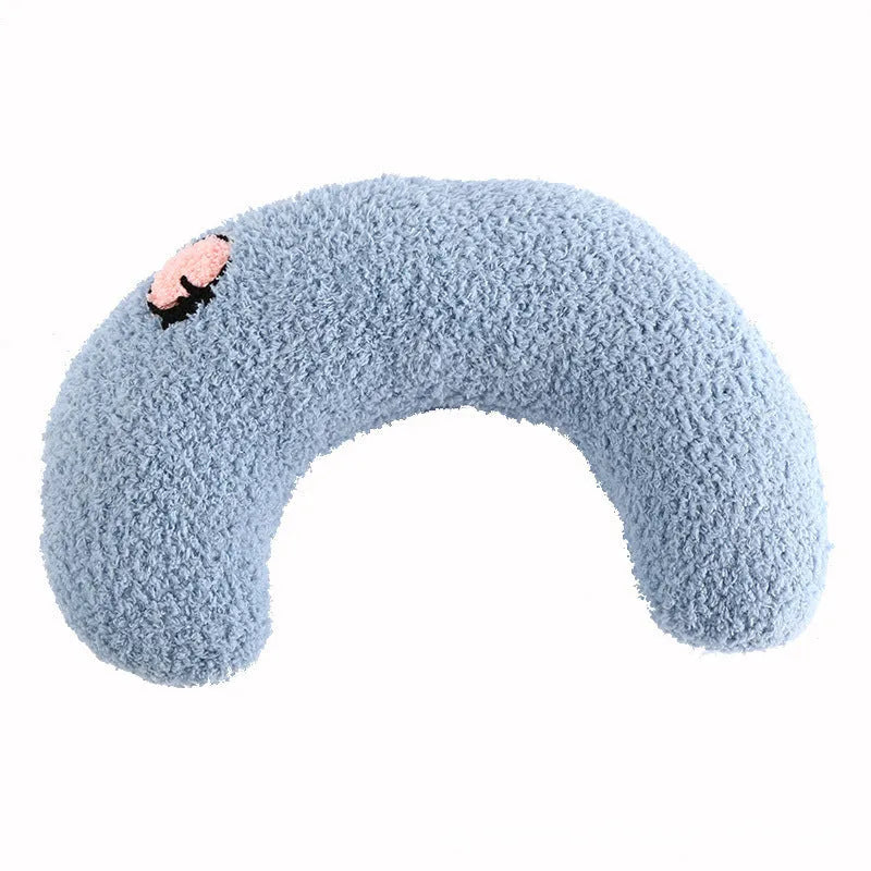 Small half-donut shaped plush pet pillow in blue, showing U-shaped design for cat or small dog neck support.