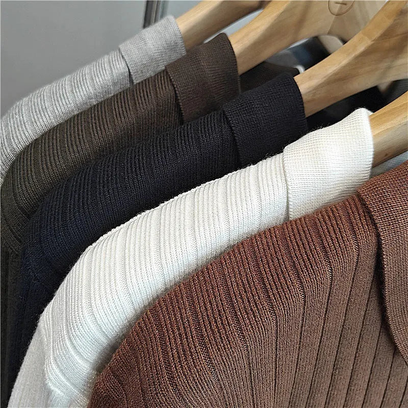 Men's grey striped knitted sweater with a lapel collar, shown in a loose fit.