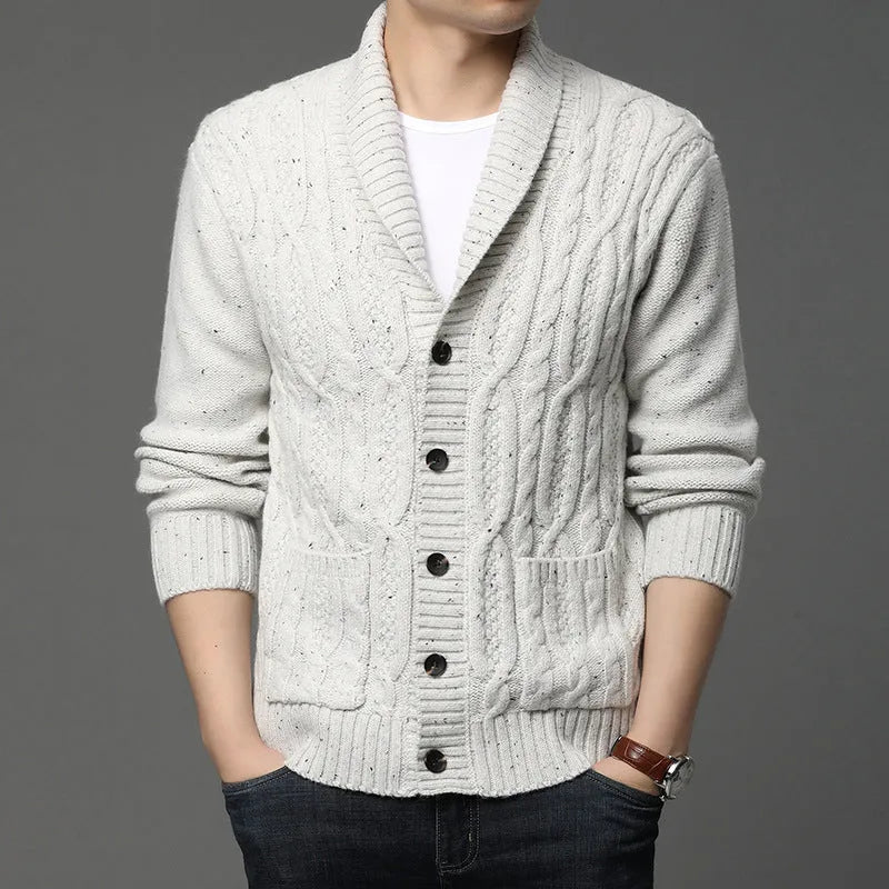 Man wearing a dark grey Korean style jacquard knitted cardigan jacket with a straight cut.