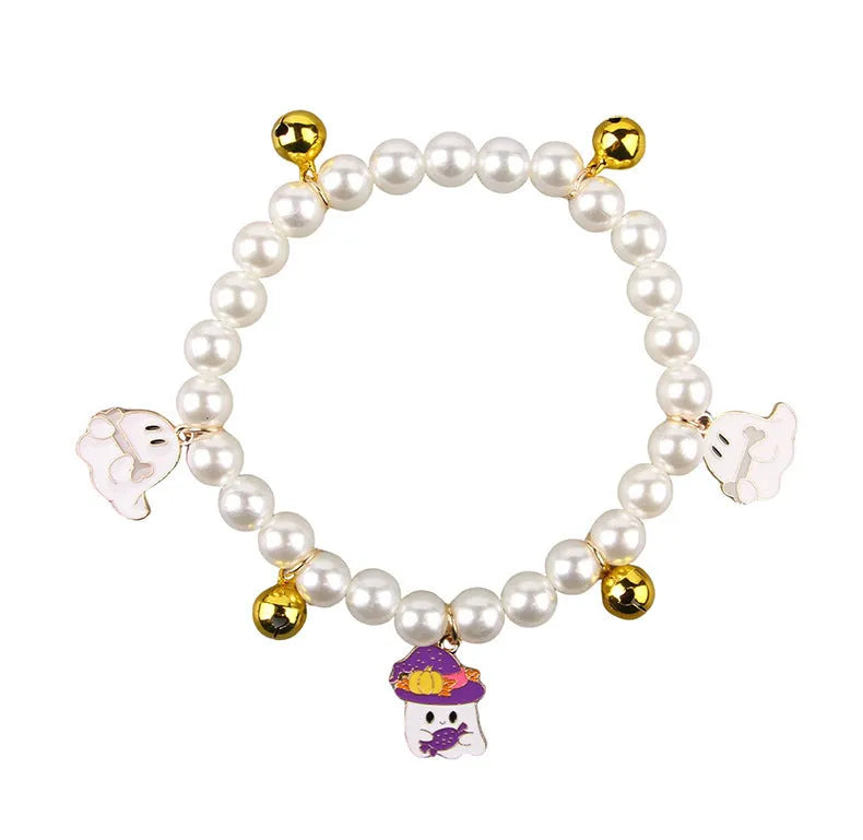 Halloween pearl necklace pet collar with pumpkin designs in purple ghost, skull, and smiling variations