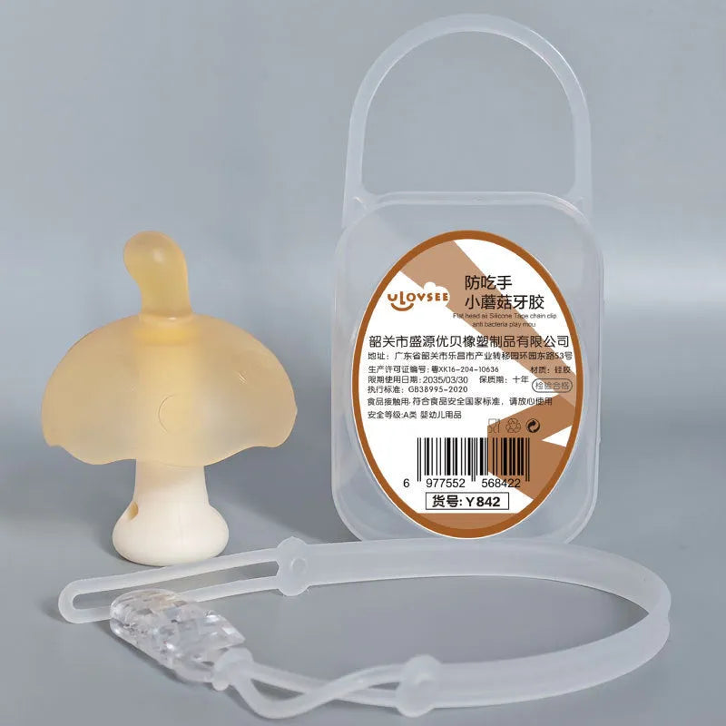 Small latex mushroom gum silicone toy in a transparent box with a chain.