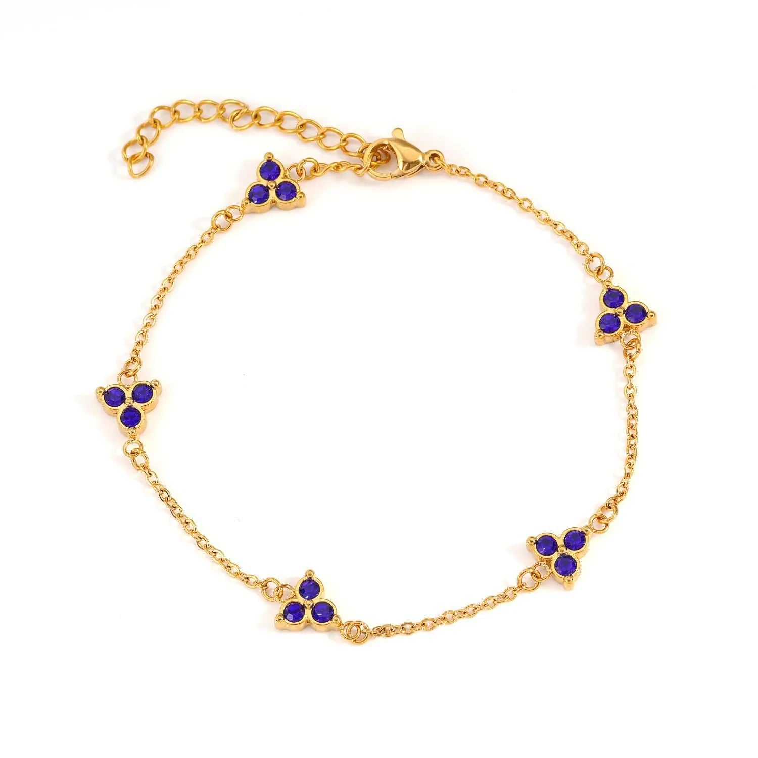Women's stainless steel geometric bracelet with triangle design and three-diamond centrepiece in gold or steel finish.