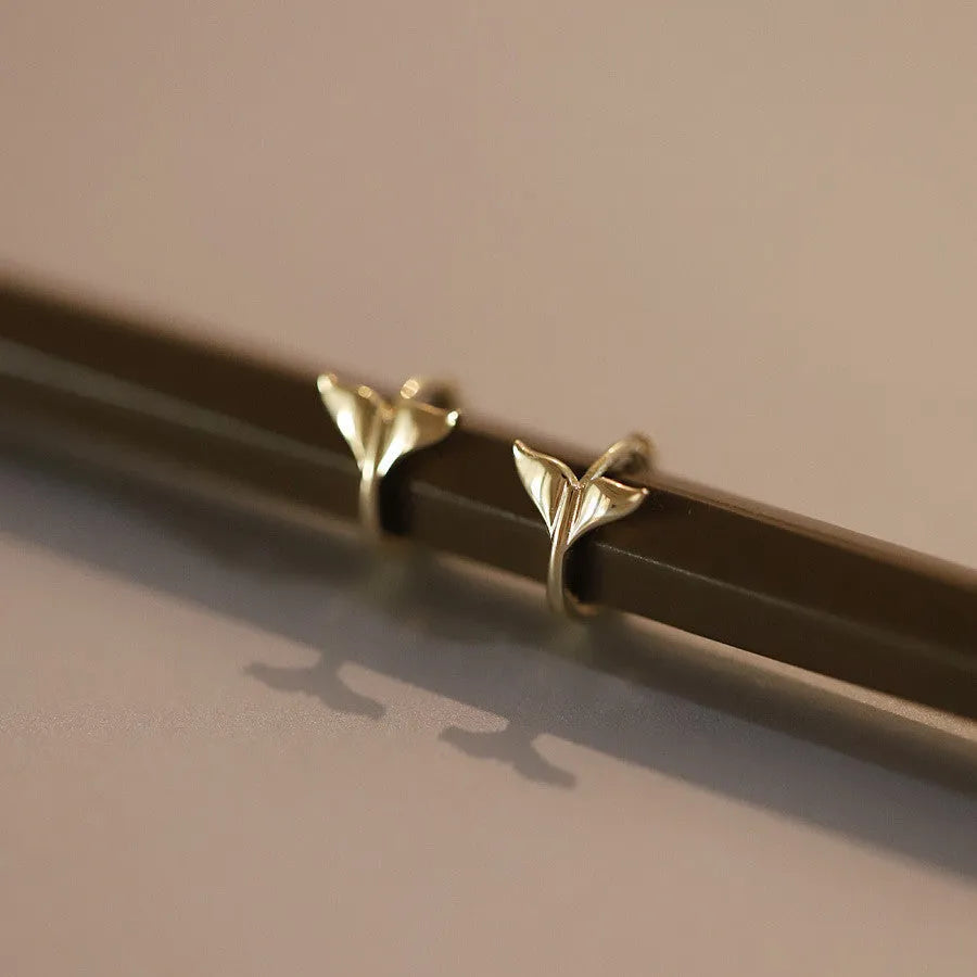 S925 sterling silver fishtail earrings in gold and white gold colours with 8mm inner diameter