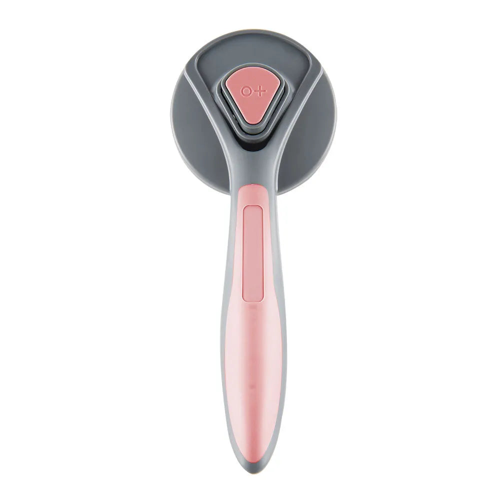 Grey self-cleaning slicker brush for grooming cats and dogs on a wooden table.