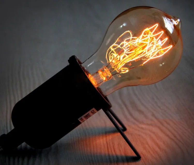 40W E27 retro bulb with milky beak shape emitting warm white light for bar cafe use