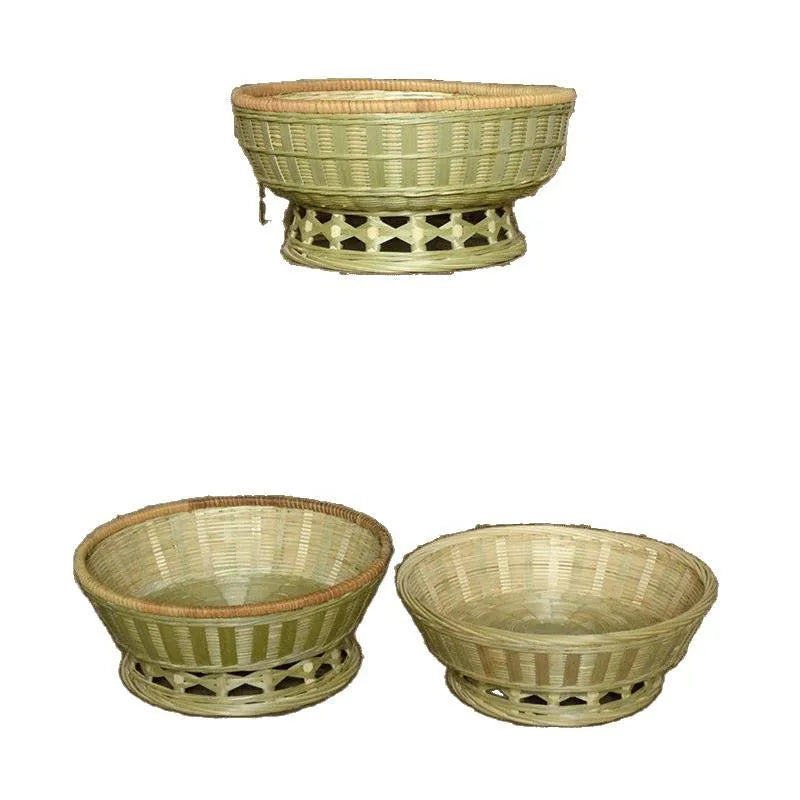Three handmade bamboo storage baskets in different sizes including one with deepening design