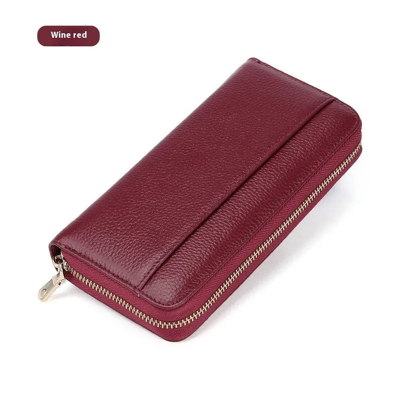Genuine leather long wallet for women in multiple colours with large capacity and anti-theft card slots.