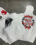 Black hooded sweatshirt cardigan with printed skull pattern and rhinestone detailing