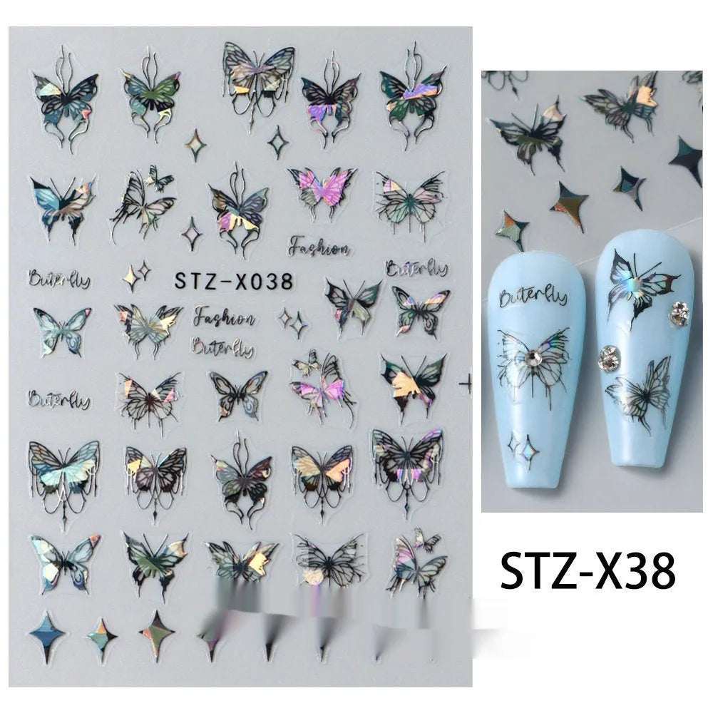Pack of black and silver striped nail art stickers with cartoon and love pattern designs.