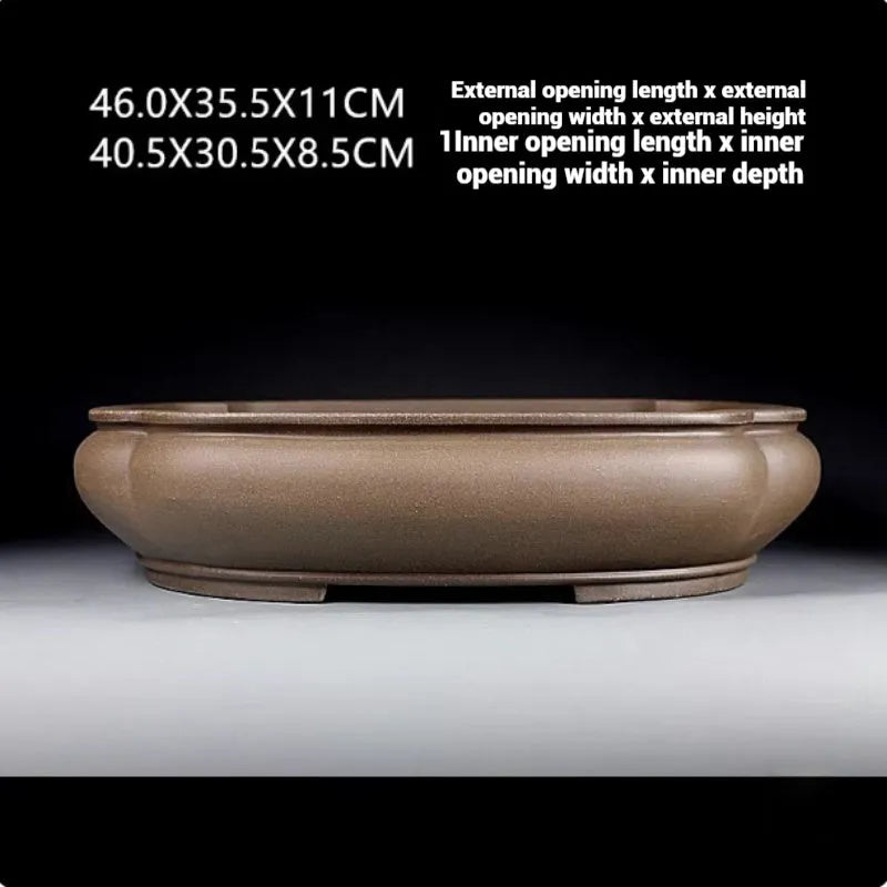 Handmade purple clay papaya-shaped flower pot measuring 46cm long with antique Pukou design