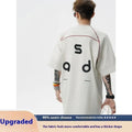 Cotton short-sleeve t-shirt with letter print design in loose fit showing round neck collar