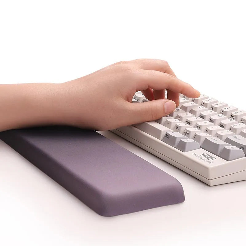 Square silica gel wrister mouse pad with cloth surface showing colour options including black, blue, pink and purple