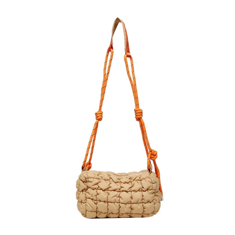 Women's lightweight nylon messenger bag in pillow shape with crossbody strap and rhombus pattern