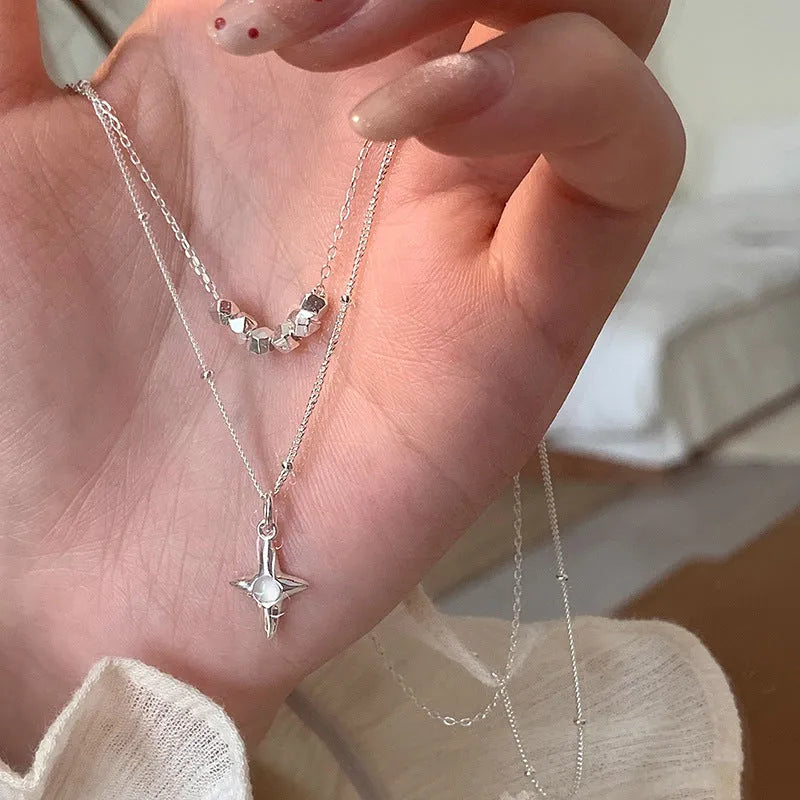 Double layer stainless steel opal cross necklace for women, rustproof, colour XL3329, on display