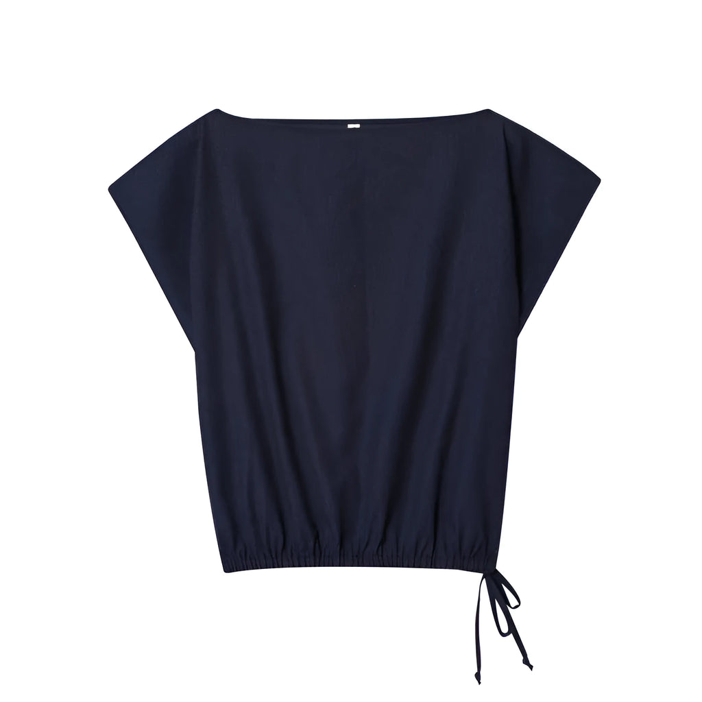 Women's off-neck polyester shirt with flounced sleeves paired with matching wide-leg trousers.