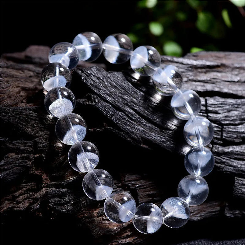 Women's white crystal bracelet with pyramid charm and Ruyi decorative elements